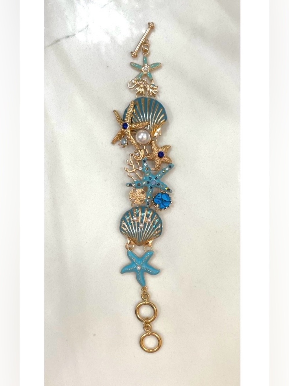Elegant & Beautiful Gold Sea Life Charm Bracelet with Blue-Green Accents